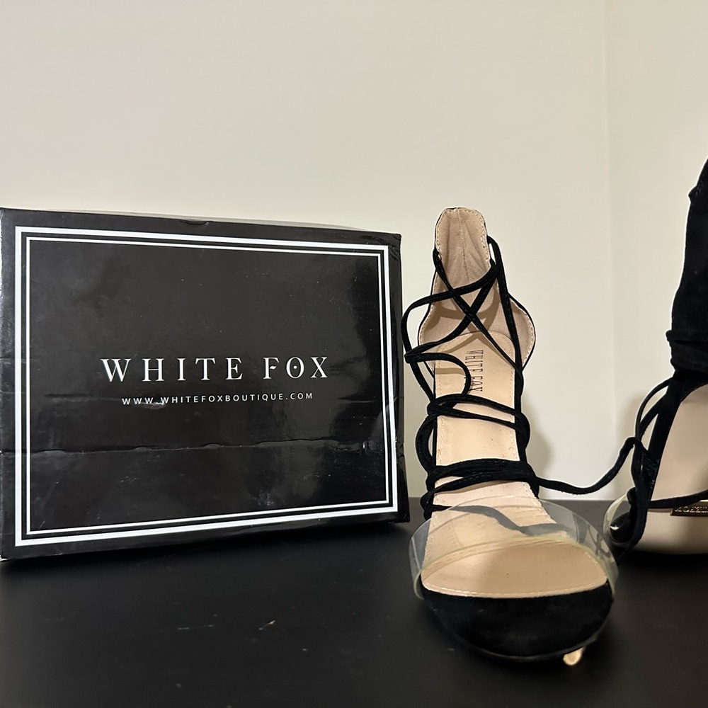 White fox black heels
